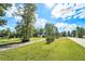 House exterior view, driveway and landscaping at 1736 Pleasant Grove Rd, Temple, GA 30179