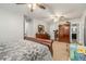 Spacious bedroom with hardwood floors and a large dresser at 1736 Pleasant Grove Rd, Temple, GA 30179