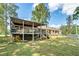 Large backyard with a deck, and above-ground pool at 1736 Pleasant Grove Rd, Temple, GA 30179