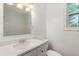 Modern bathroom with white subway tile and updated vanity at 408 Belgarde Place Se, Atlanta, GA 30354