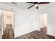 Bedroom with ceiling fan and access to a full bathroom at 408 Belgarde Place Se, Atlanta, GA 30354