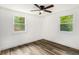 Spacious bedroom with ceiling fan and hardwood floors at 408 Belgarde Place Se, Atlanta, GA 30354