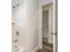 Clean bathroom with shower/tub combo and updated fixtures at 408 Belgarde Place Se, Atlanta, GA 30354