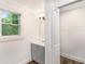 Small bathroom with vanity and window at 408 Belgarde Place Se, Atlanta, GA 30354