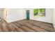 Spacious living area with wood-look flooring and an open concept at 408 Belgarde Place Se, Atlanta, GA 30354
