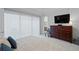 Bright bedroom with sliding doors leading to balcony at 756 Stickley Oak Way, Woodstock, GA 30189