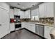 Modern kitchen with stainless steel appliances and granite countertops at 1567 Maplecliff Way, Sugar Hill, GA 30518