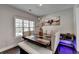 Spacious dining area featuring a rustic wood table and natural light at 1567 Maplecliff Way, Sugar Hill, GA 30518