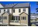 Rear exterior view showcasing a home's deck and architectural details at 2021 Cortland Rd, Milton, GA 30009