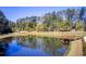 Community pond with walking path and gazebo at 2021 Cortland Rd, Milton, GA 30009