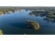 Aerial view of lake community and island at 7149 Burnside Ct, Villa Rica, GA 30180