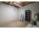 Unfinished basement with shelving and a ladder at 7149 Burnside Ct, Villa Rica, GA 30180
