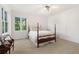 Serene bedroom with carpeted floors and a charming window at 7149 Burnside Ct, Villa Rica, GA 30180