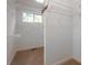 Large walk-in closet with ample shelving at 7149 Burnside Ct, Villa Rica, GA 30180