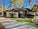 Ranch style home with stone accents and landscaped lawn at 7149 Burnside Ct, Villa Rica, GA 30180