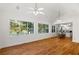 Spacious great room with hardwood floors and lake views at 7149 Burnside Ct, Villa Rica, GA 30180