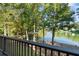 Deck offers tranquil lake views and natural beauty at 7149 Burnside Ct, Villa Rica, GA 30180