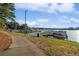 Paved walkway offering scenic lake views at 7149 Burnside Ct, Villa Rica, GA 30180
