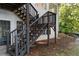 Exterior stairs lead from deck to backyard at 7149 Burnside Ct, Villa Rica, GA 30180