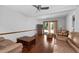 Gathering room with hardwood floors and access to the backyard at 5934 S Deshon Ct, Lithonia, GA 30058