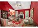 Bright living room with hardwood floors, fireplace, and access to the backyard at 2797 Club Forest Dr, Conyers, GA 30013