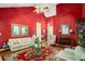 Spacious living room featuring hardwood floors, a large window, and a cozy seating area at 2797 Club Forest Dr, Conyers, GA 30013