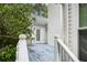 Light blue deck with white railings and access to the backyard at 2797 Club Forest Dr, Conyers, GA 30013