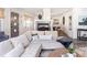 Spacious living area featuring a sectional sofa and fireplace at 7350 Ono Rd, Palmetto, GA 30268