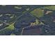 Aerial view showing home site and surrounding area, including a pond at 7350 Ono Rd, Palmetto, GA 30268
