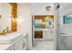 Modern bathroom with white cabinets, marble floors, and a walk-in shower at 7350 Ono Rd, Palmetto, GA 30268