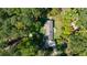 Bird's-eye view of house, showcasing the property's wooded surroundings at 7350 Ono Rd, Palmetto, GA 30268