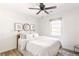 Spacious bedroom with a queen-size bed and ceiling fan at 7350 Ono Rd, Palmetto, GA 30268