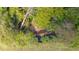 Aerial view of a wooded area with a creek running through it at 7350 Ono Rd, Palmetto, GA 30268