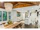 Modern kitchen with white cabinets, farmhouse sink, and expansive island at 7350 Ono Rd, Palmetto, GA 30268