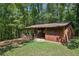 Rustic barn with fenced area, ideal for storage or animals at 7350 Ono Rd, Palmetto, GA 30268