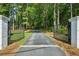 Long private driveway with gated entrance at 7350 Ono Rd, Palmetto, GA 30268