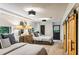Spacious guest bedroom with twin beds, ample closet space and barn doors at 7350 Ono Rd, Palmetto, GA 30268