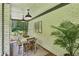 Bright sunroom with dining area and plenty of natural light at 7350 Ono Rd, Palmetto, GA 30268