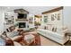 Open living area with a whitewashed brick fireplace and ample natural light at 7350 Ono Rd, Palmetto, GA 30268