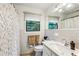 Simple bathroom with white tile, a shower/tub combo and updated vanity at 7350 Ono Rd, Palmetto, GA 30268