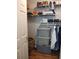 Large walk-in closet with shelving and storage bins at 115 Elberta St, Mcdonough, GA 30253