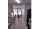 Bright kitchen with bay window and eat-in area at 115 Elberta St, Mcdonough, GA 30253