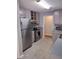 Modern kitchen with stainless steel appliances and gray cabinets at 115 Elberta St, Mcdonough, GA 30253