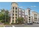 Modern apartment building exterior with balconies and street view at 390 17Th Nw St # 5005, Atlanta, GA 30363