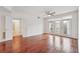 Hardwood floor living room with access to bathroom and balcony at 390 17Th Nw St # 5005, Atlanta, GA 30363