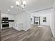 Renovated kitchen with stainless steel appliances and white shaker cabinets at 3563 Denby Dr, Snellville, GA 30039
