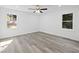 Spacious bedroom with hardwood floors and ceiling fan at 3563 Denby Dr, Snellville, GA 30039