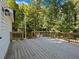 Spacious wooden deck with wooded view at 3563 Denby Dr, Snellville, GA 30039