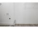 Laundry closet with vinyl flooring, shelving, and hookups at 3563 Denby Dr, Snellville, GA 30039