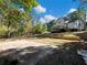 Large backyard with concrete patio and shed at 3563 Denby Dr, Snellville, GA 30039